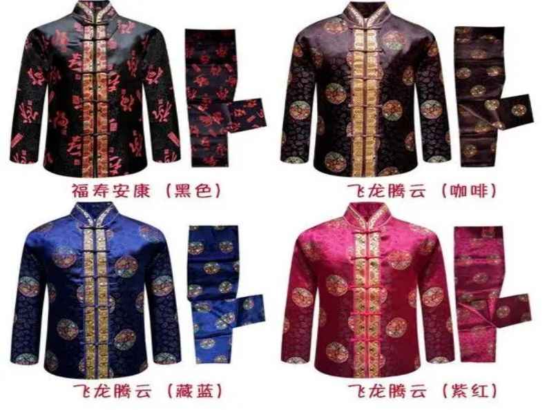 在北京陵园文化中，骨灰盒和寿衣的颜色有什么象征与寓意